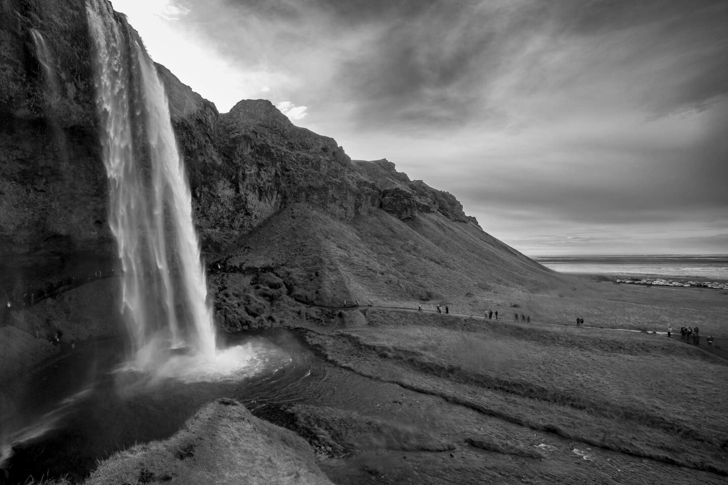 black and white image of seljalandsfoss waterfall in iceland